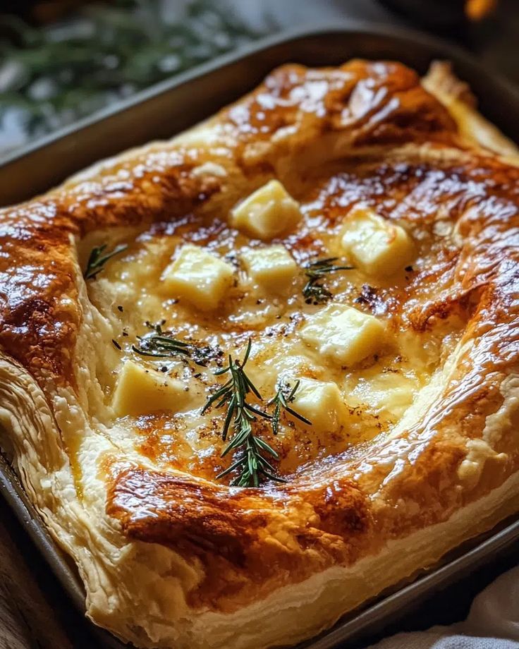 baked gruyere in pastry with rosemary and garlic